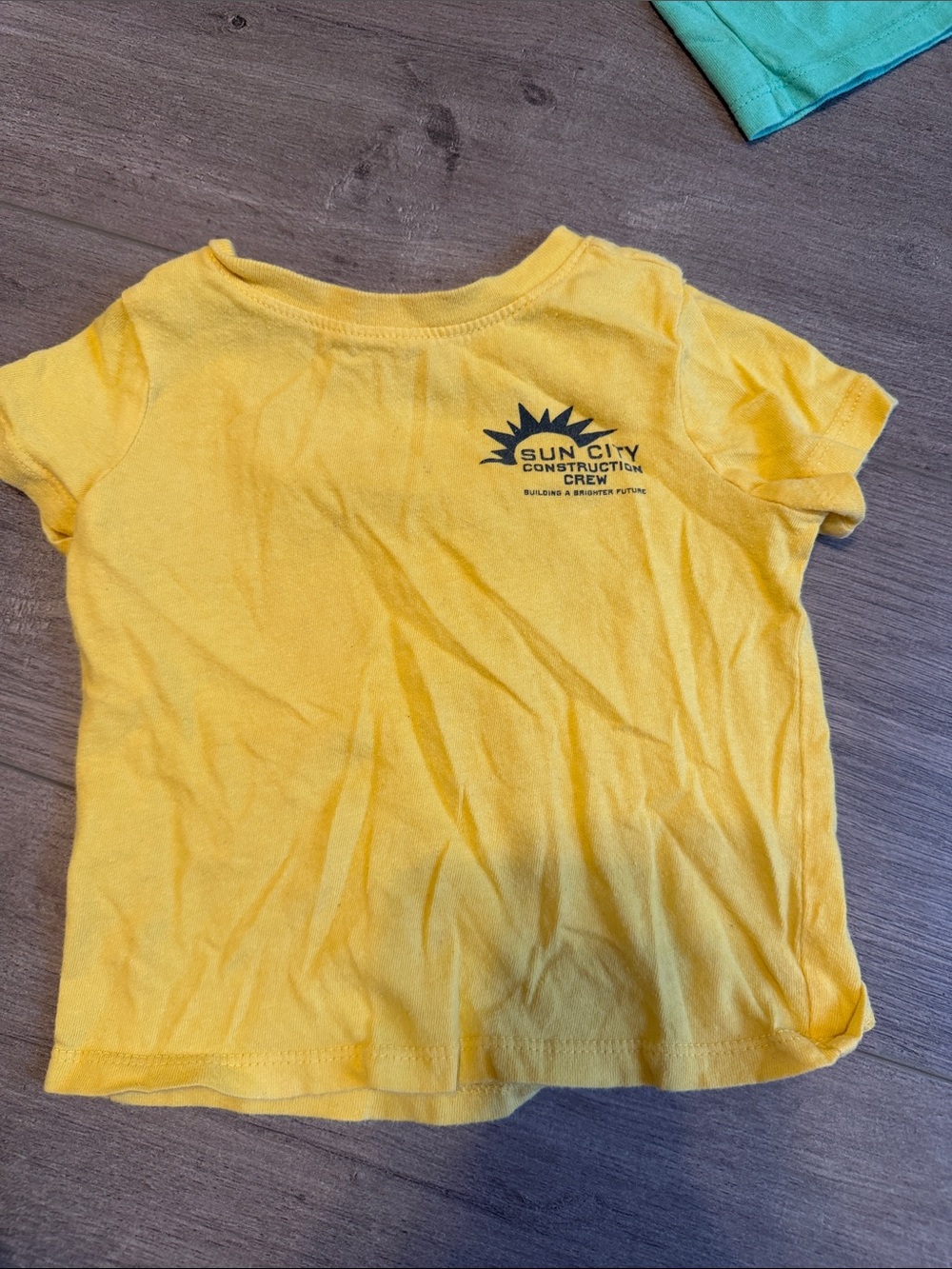 Old Navy Yellow 'Sun City Construction Crew' Short Sleeve Tee